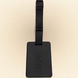 Rains Travel Tag Black